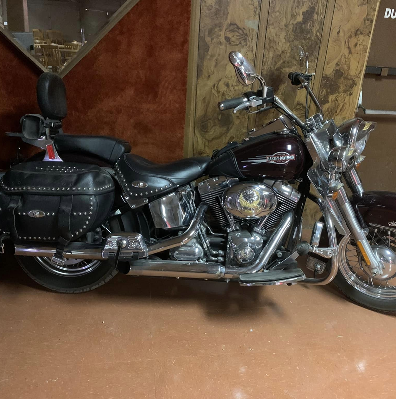 A photo of a motorcycle in the Wayne Street garage during the garage sale.